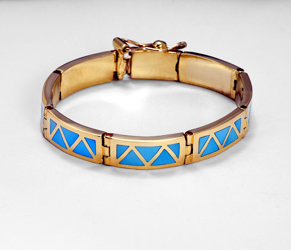 Trésors de St Barth Gold and turquoise bracelet strung on leather.